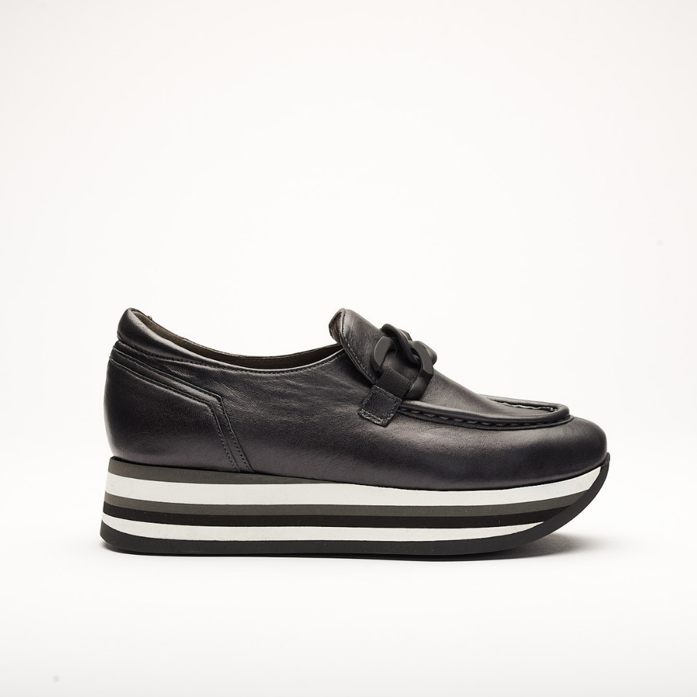 4cm platform shoe with white, black and grey stripes made entirely of leather. It is made in Sena Black. It has a Black application on the front of the shoe and the back is padded.
