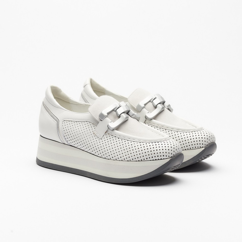 This is a modern platform loafer in a premium leather, featuring a perforated design for breathability and style. The shoe has a sleek, elevated sole with white and silver stripes, adding a sporty yet sophisticated touch. A decorative metallic chain detail on the strap enhances its elegance, making it a versatile choice for both casual and chic outfits.